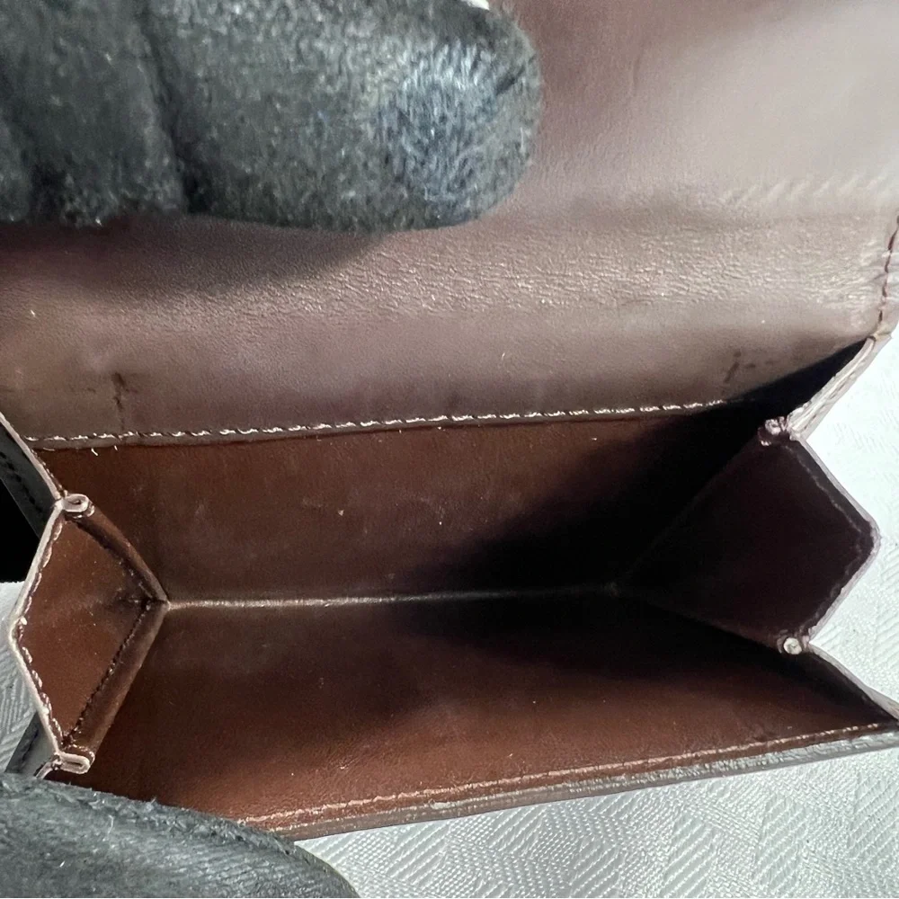 1083: Louis Vuitton Vintage Brown Epi Leather Compact Wallet